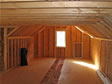 Attic area shows where “mate walls” meet in the center, before flooring is installed in this area